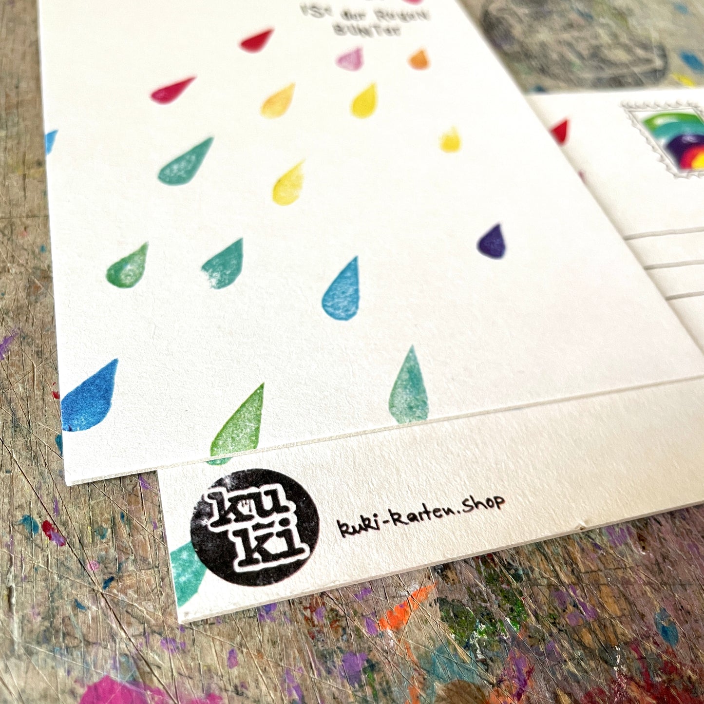kuki Postkarte „Mit dir ist Regen bunter“